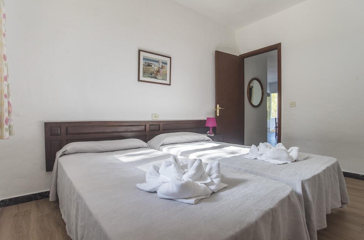 Apartamentos Pinomar Es Caló de Sant Agustí Esterno foto